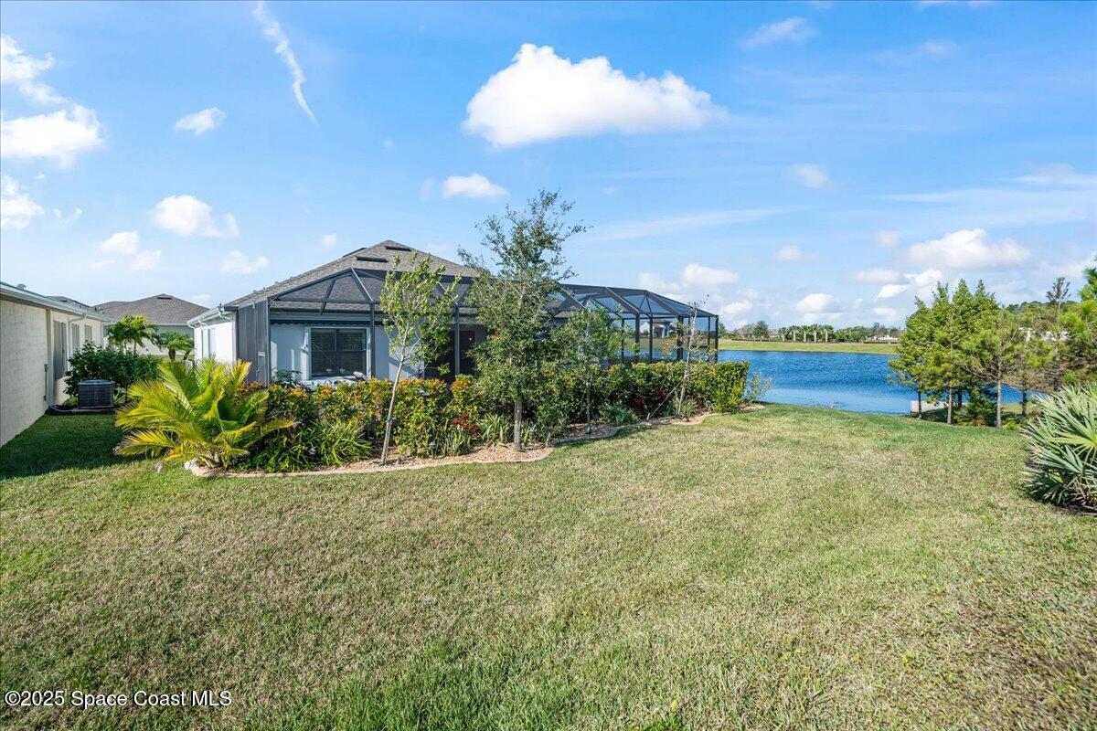 2190 Caravan Place Melbourne, FL 32940 - Photo 45 of 46 a front view of a house with garden