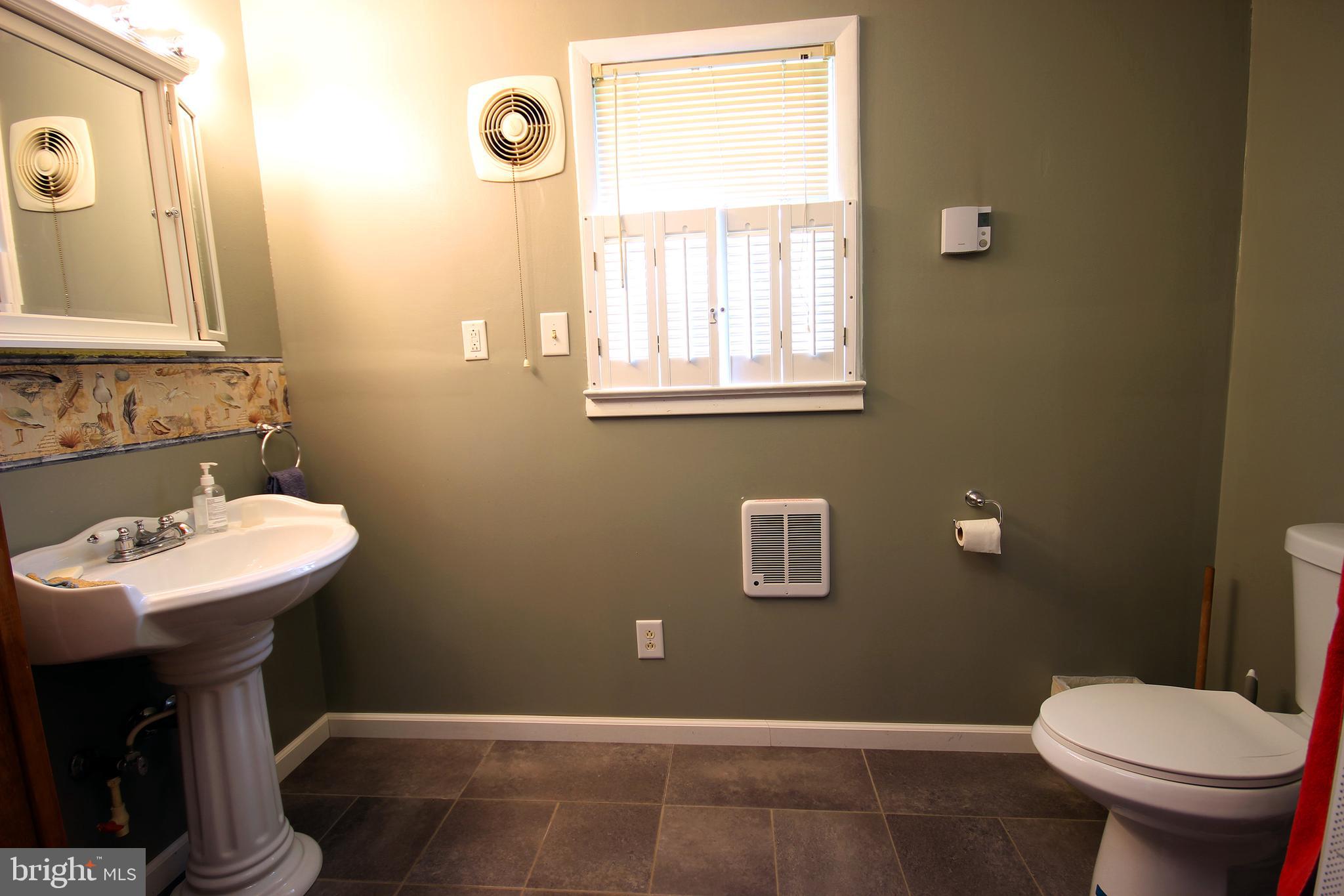 23285 H. Milbourne Road Deal Island, MD 21821 - Photo 11 of 14 Full Bathroom / Laundry Room