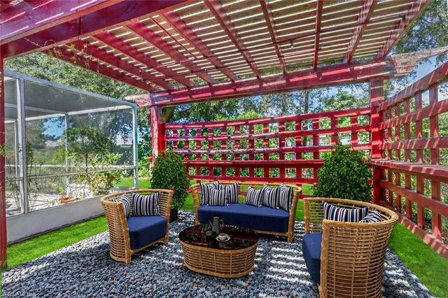 a outdoor living space with furniture and garden view