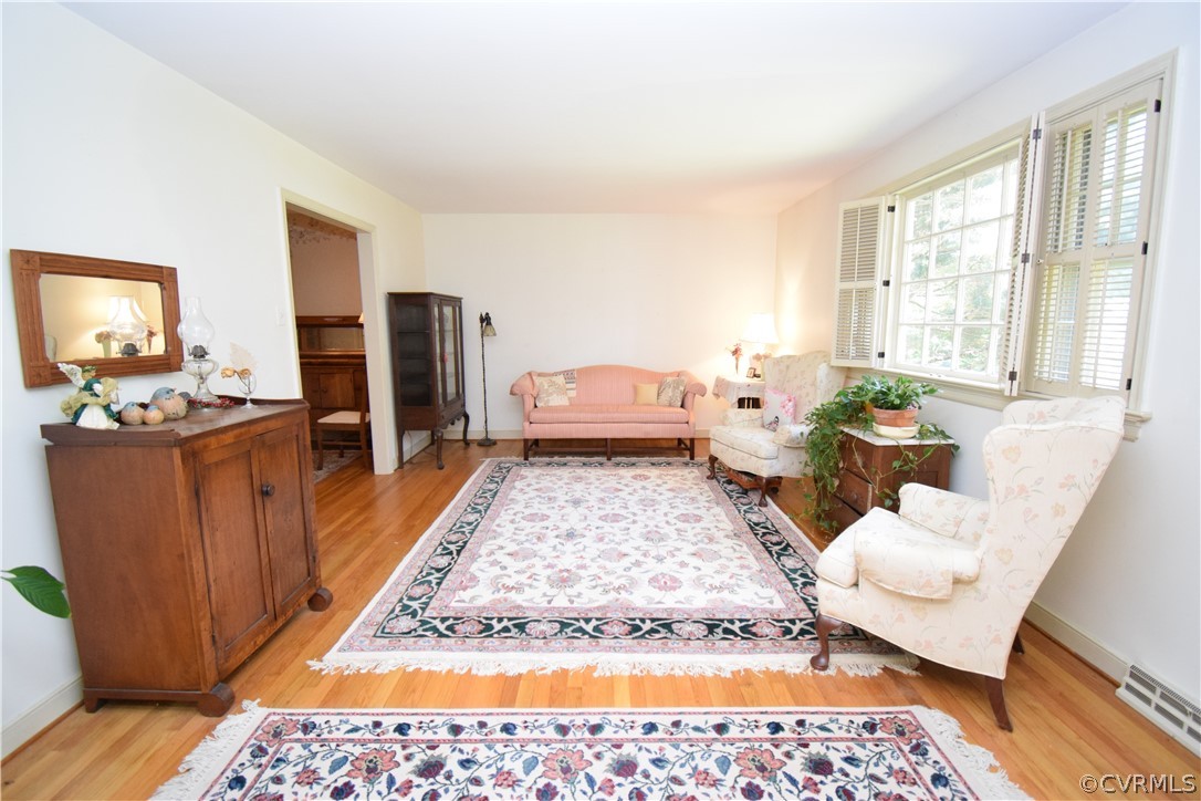 10921 Stepney Road Chester, VA 23831 - Photo 14 of 34 a living room with furniture rug and a table
