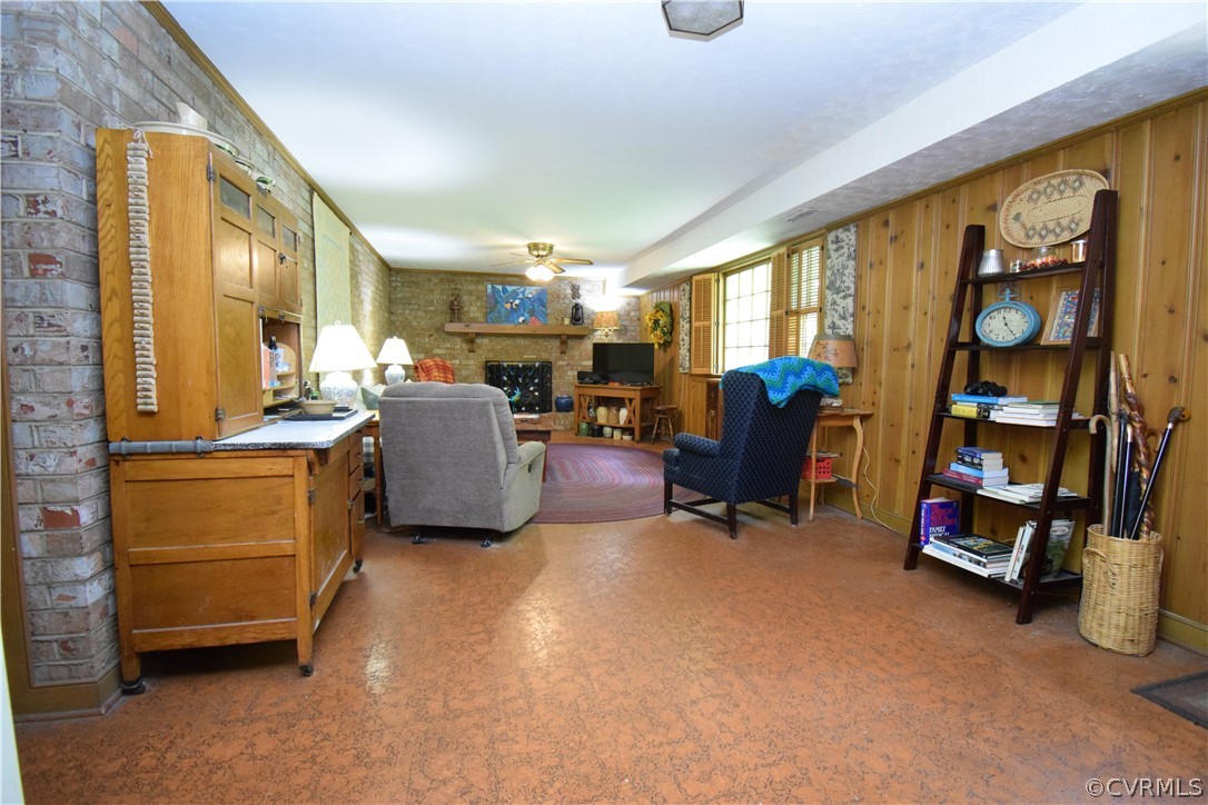 10921 Stepney Road Chester, VA 23831 - Photo 21 of 34 a living room with furniture and a flat screen tv