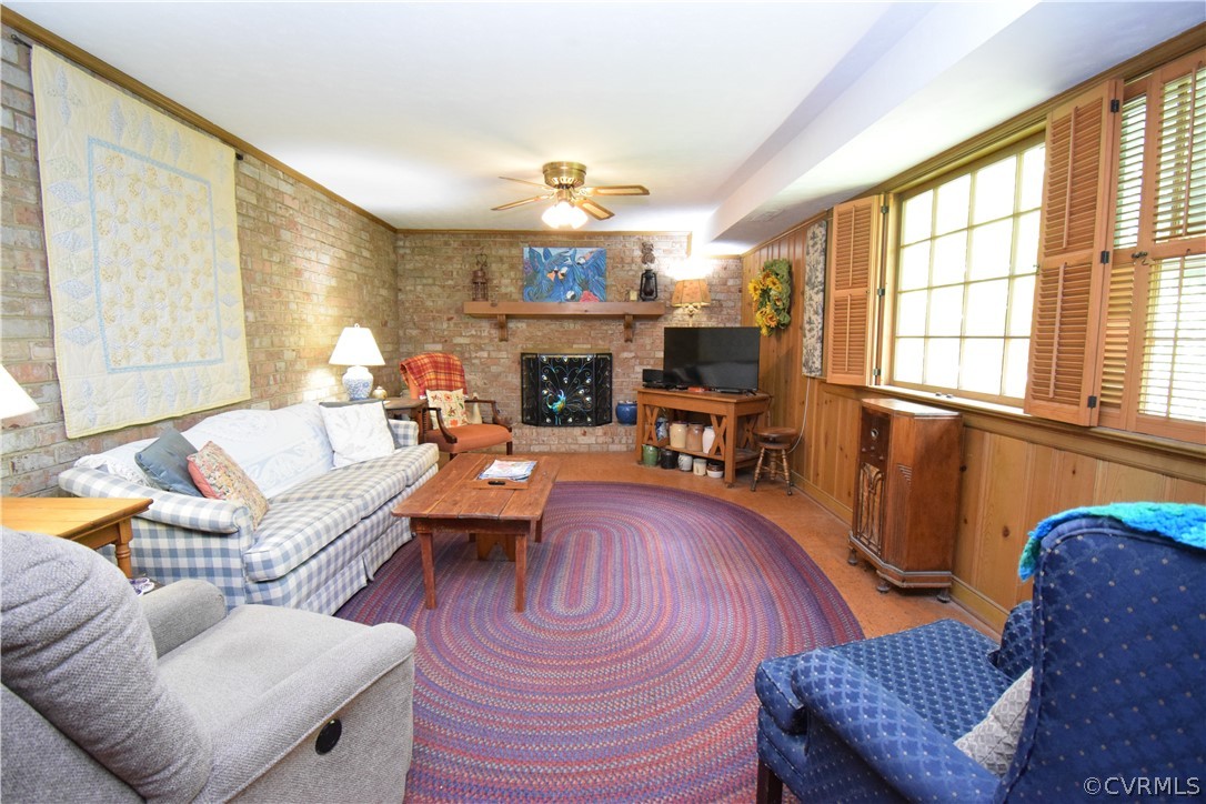 10921 Stepney Road Chester, VA 23831 - Photo 22 of 34 a living room with furniture and a fireplace