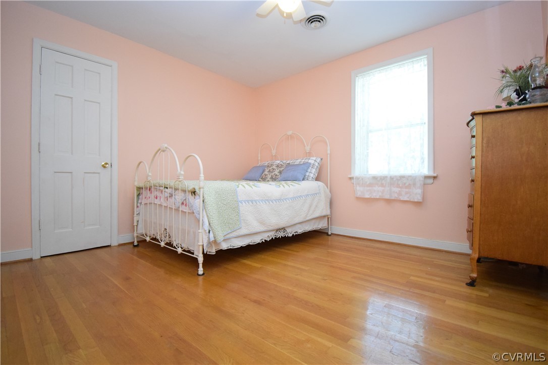 10921 Stepney Road Chester, VA 23831 - Photo 27 of 34 a view of a bedroom with bed and window