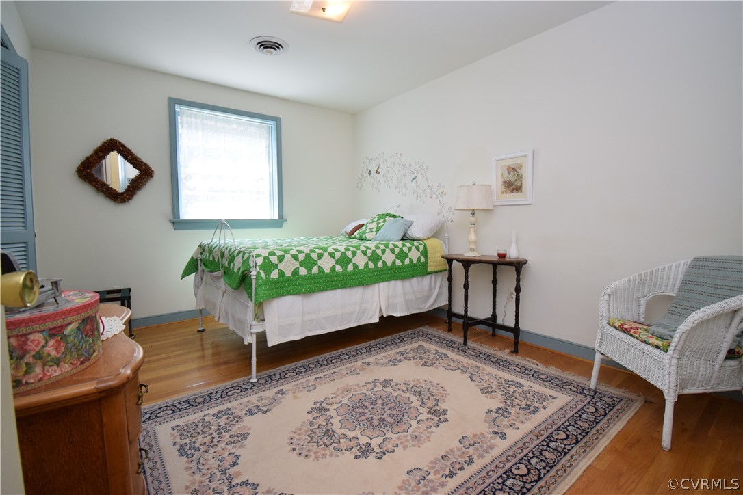 10921 Stepney Road Chester, VA 23831 - Photo 29 of 34 a living room with furniture and a table