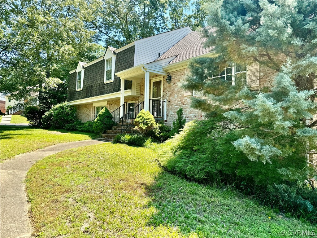 10921 Stepney Road Chester, VA 23831 - Photo 6 of 34 a view of a house with pool and garden