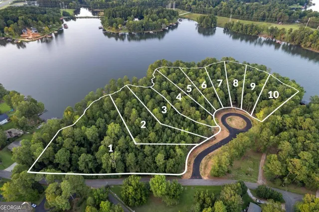 an aerial view of a swimming pool and outdoor space