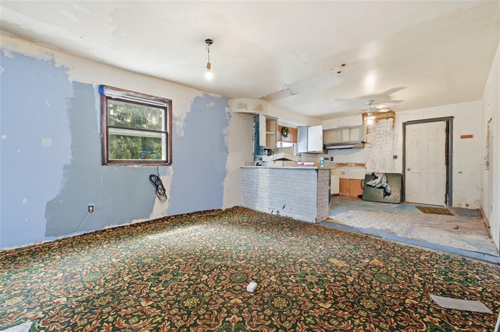 96 Meanor Street Imperial, PA 15126 - Photo 12 of 44 a view of a kitchen with a sink cabinets and a window