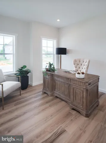 a kitchen that has a lot of cabinets a sink and a stove in it