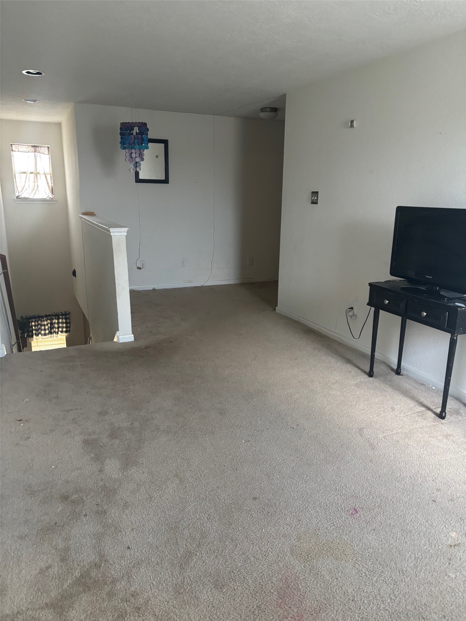 911 Belshear Court Houston, TX 77073 - Photo 12 of 21 a view of an empty room with a window