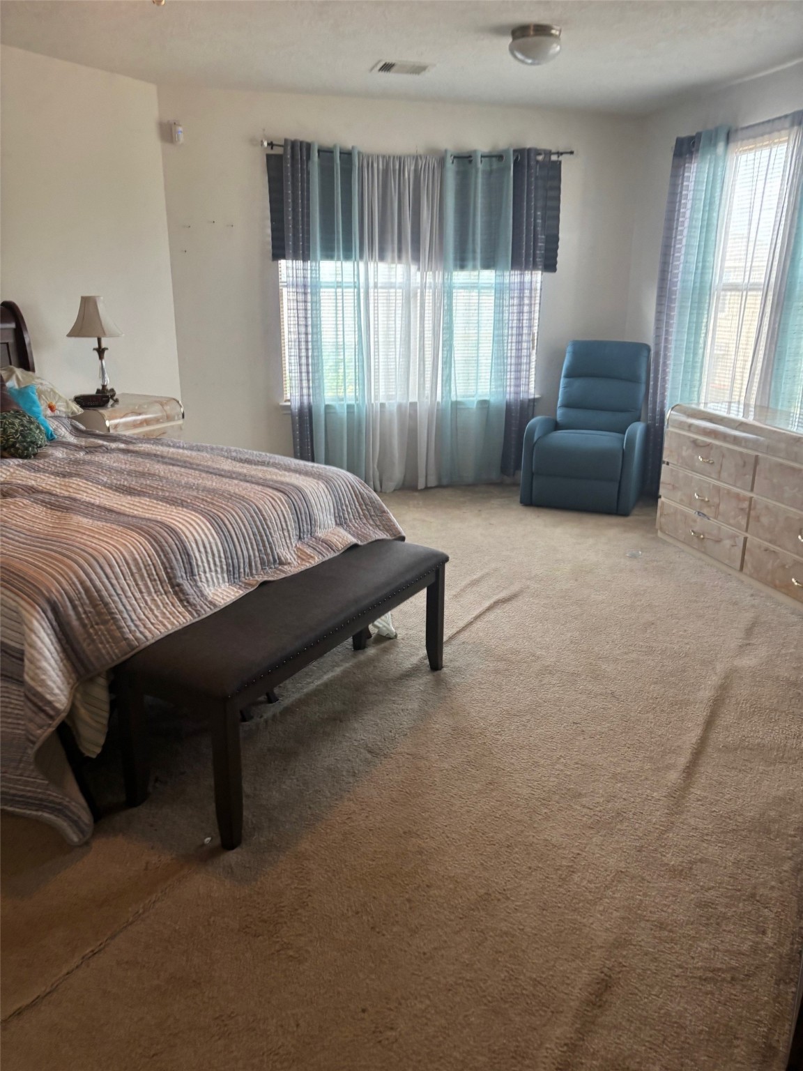 911 Belshear Court Houston, TX 77073 - Photo 14 of 21 a bedroom with a bed and window