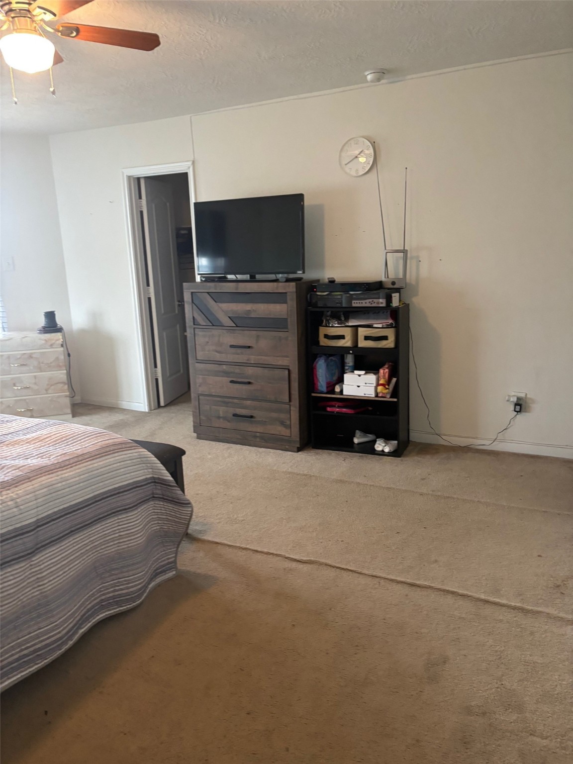 911 Belshear Court Houston, TX 77073 - Photo 18 of 21 a bedroom with a bed and furniture