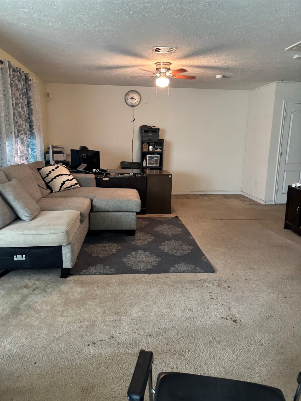 911 Belshear Court Houston, TX 77073 - Photo 4 of 21 a living room with furniture and a flat screen tv