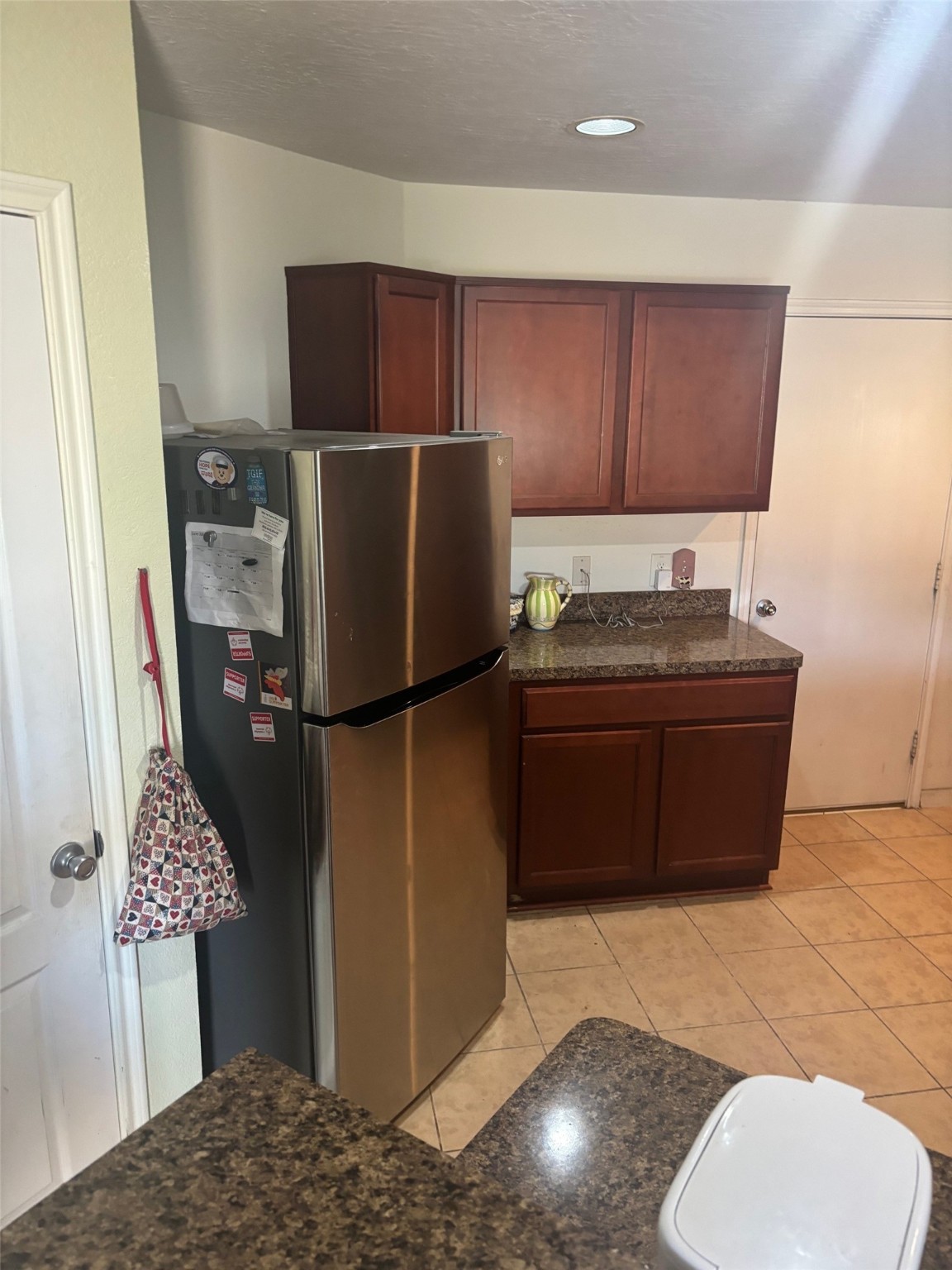 911 Belshear Court Houston, TX 77073 - Photo 10 of 21 a kitchen with stainless steel appliances granite countertop a refrigerator and a sink