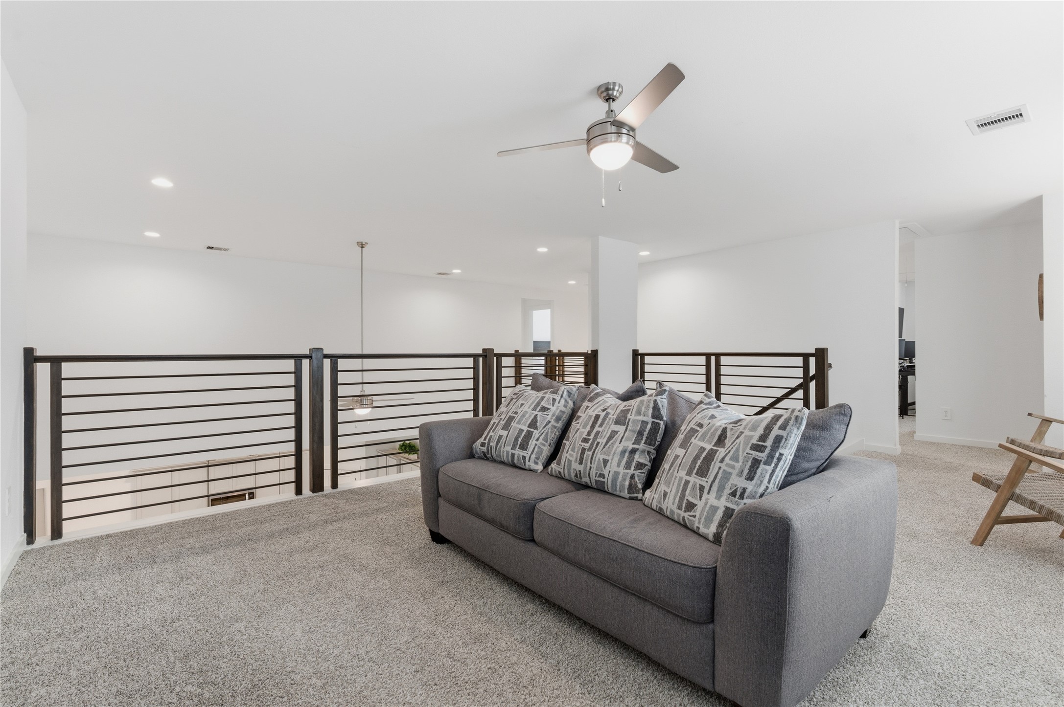 14108 Redfish Lake Conroe, TX 77384 - Photo 22 of 37 a living room with furniture and a ceiling fan