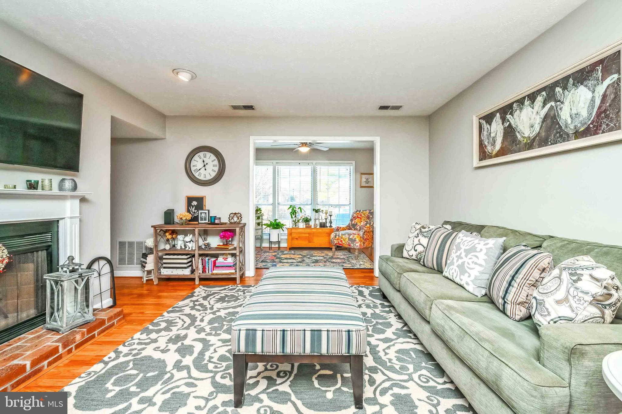 10180 Oakton Terrace Road, Unit 10180 Oakton, VA 22124 - Photo 11 of 29 Entry to sun room and den from living room