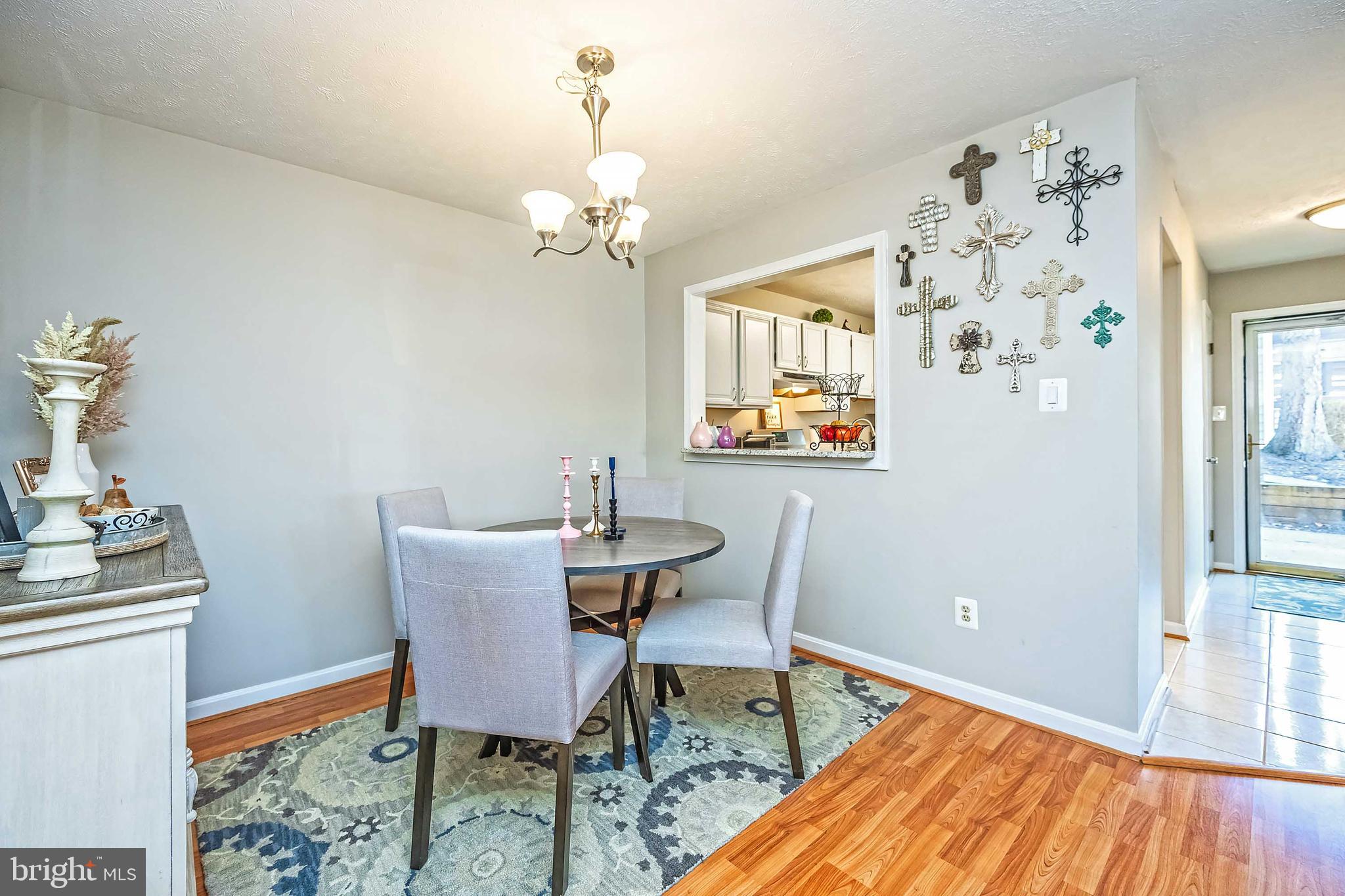 10180 Oakton Terrace Road, Unit 10180 Oakton, VA 22124 - Photo 12 of 29 Pass-through window from kitchen to dining room