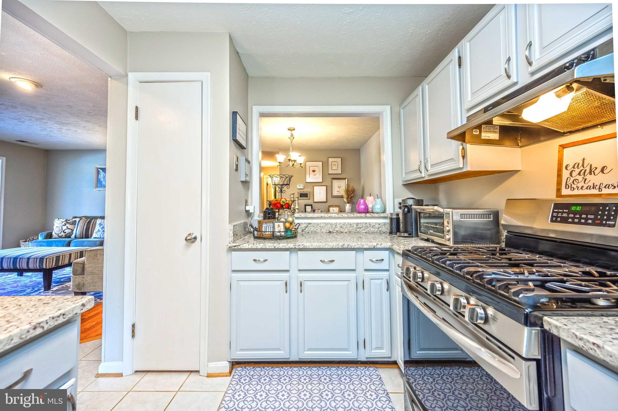 10180 Oakton Terrace Road, Unit 10180 Oakton, VA 22124 - Photo 16 of 29 Pass-through window to dining room