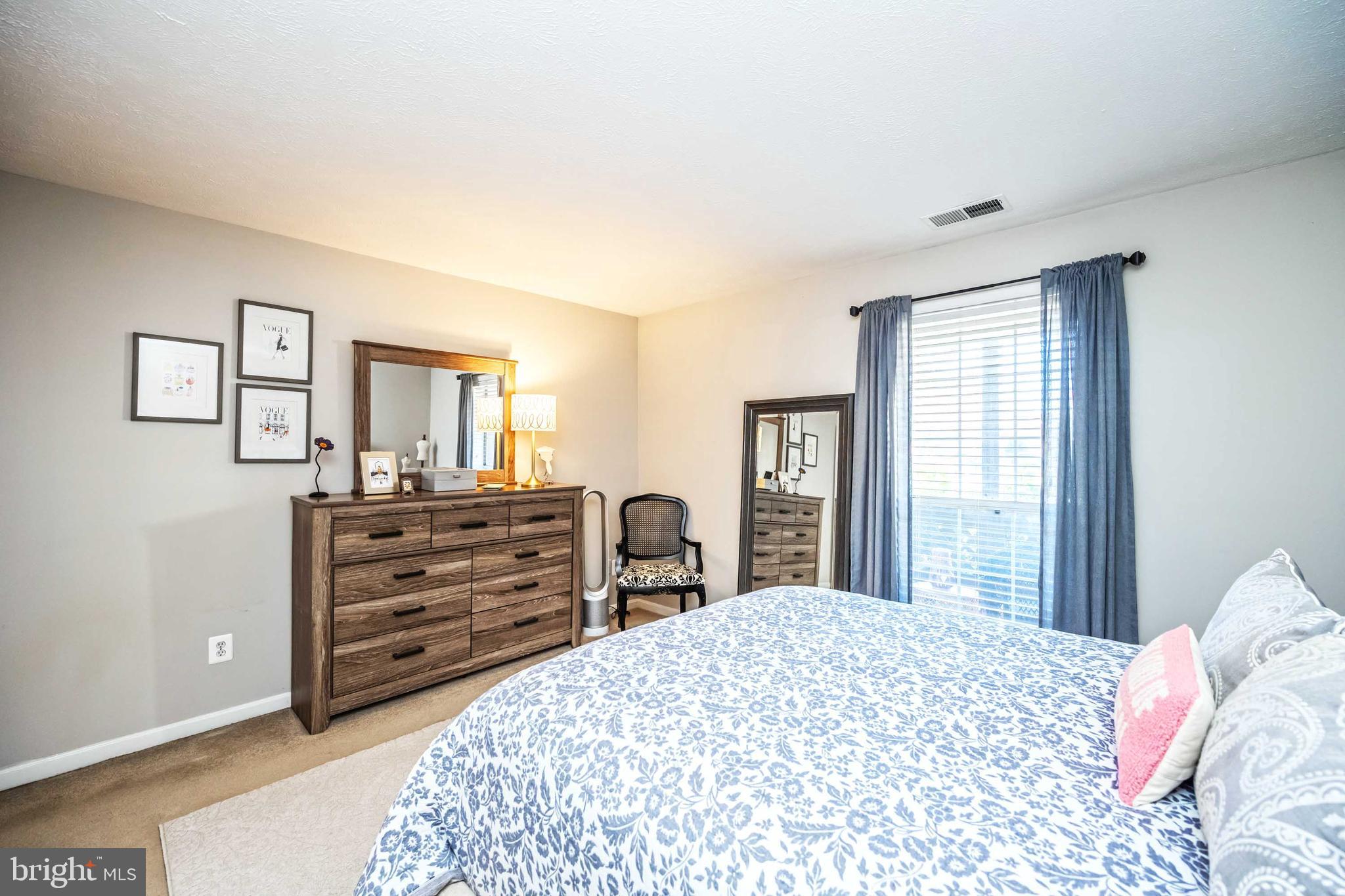 10180 Oakton Terrace Road, Unit 10180 Oakton, VA 22124 - Photo 21 of 29 Window in bedroom is always nice