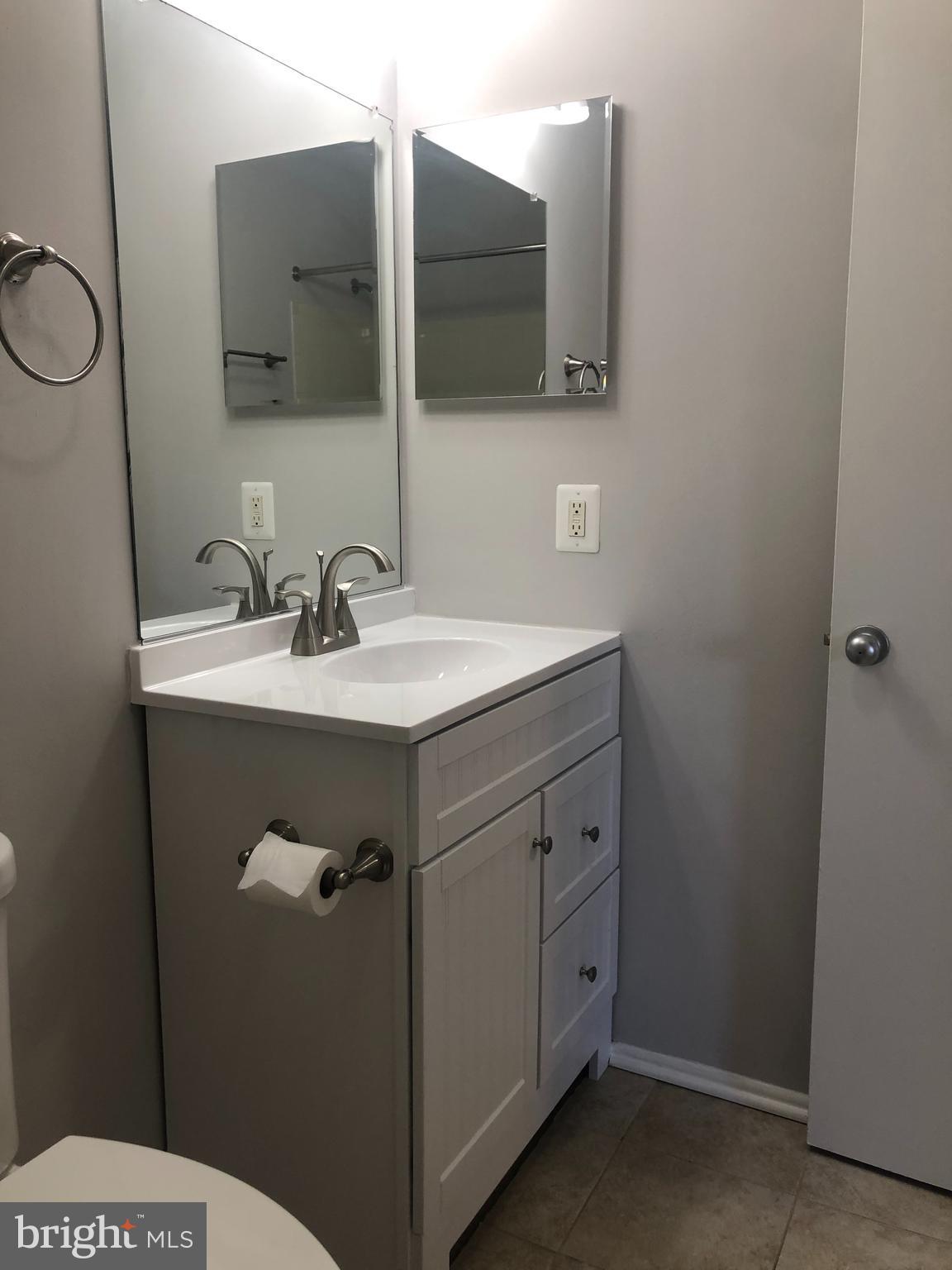 1793 Jonathan Way, Unit I Reston, VA 20190 - Photo 12 of 19 Bright and updated bathroom