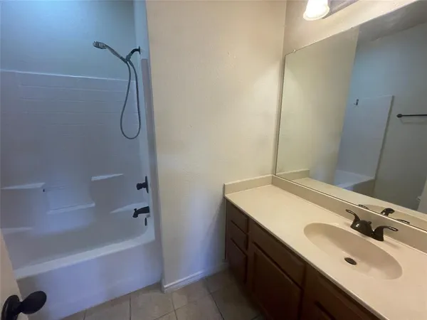 a bathroom with a sink and a bathtub
