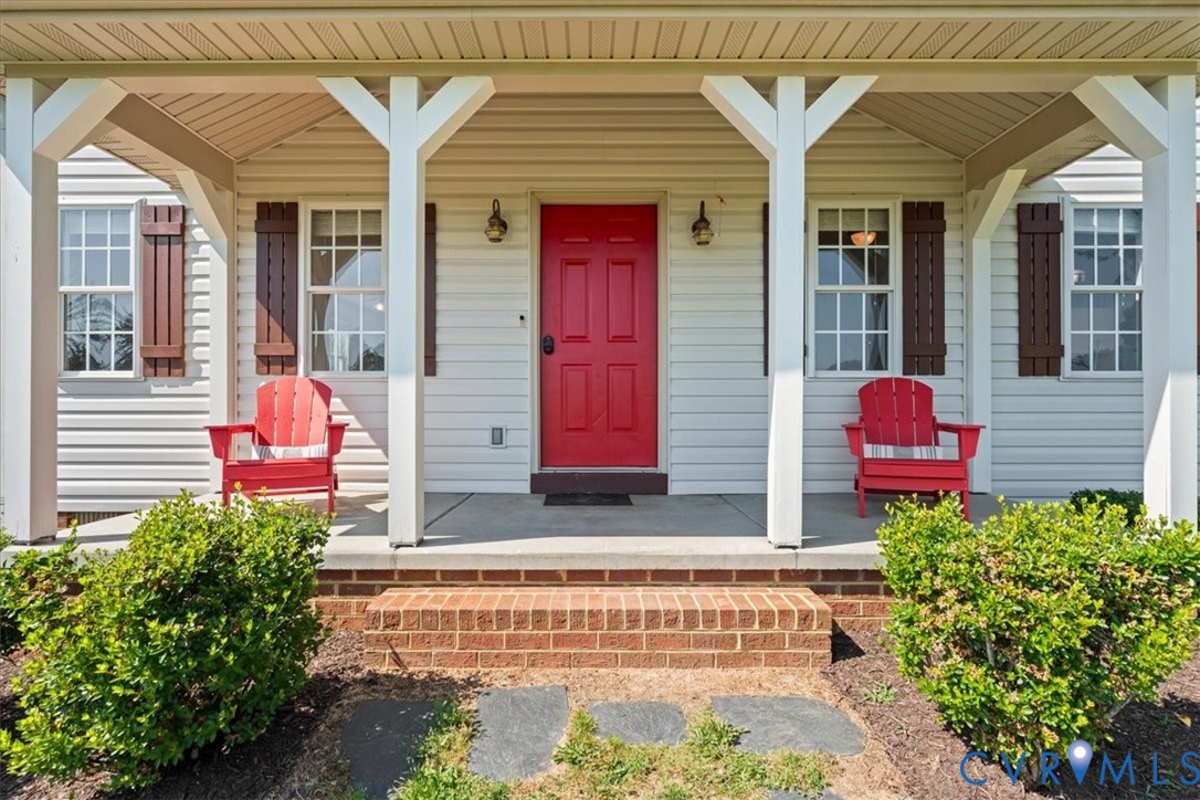 3137 Trenholm Road Powhatan, VA 23139 - Photo 8 of 72 a front view of a house with a garage