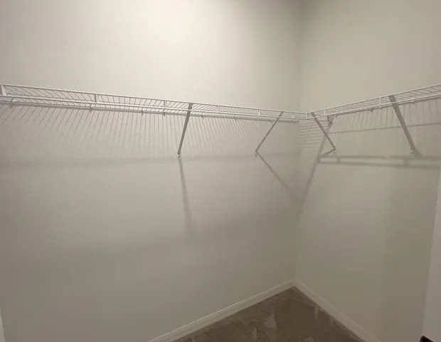 a view of small space with racks on the wall