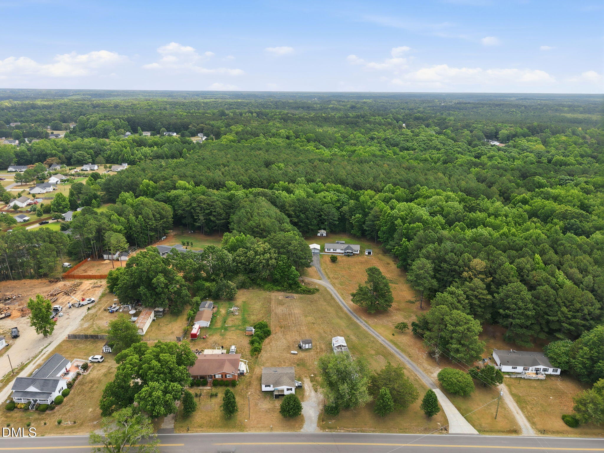 1758 Barber Mill Road Clayton, NC 27520 - Photo 39 of 41 an aerial view of residential houses with outdoor space and trees