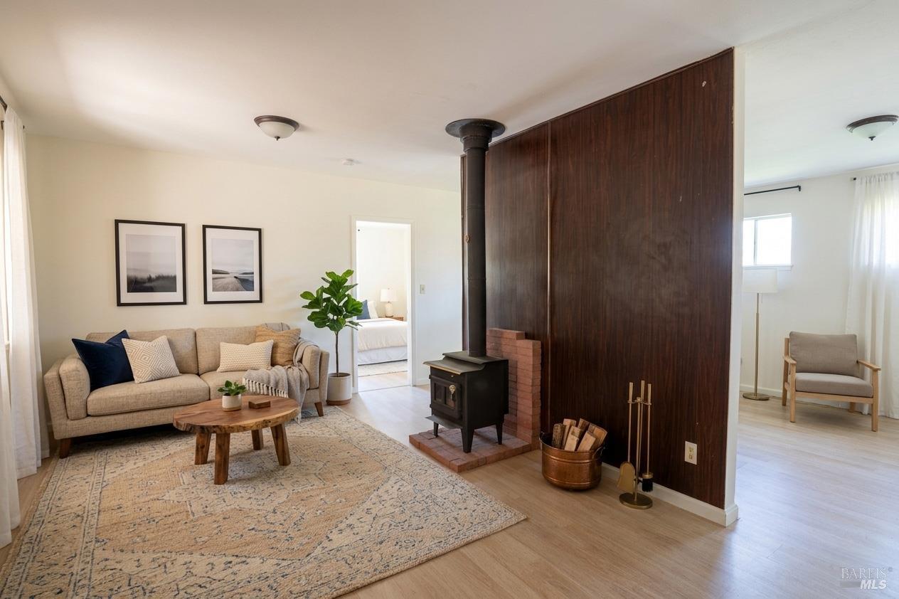 490 Cornish Lane Angwin, CA 94508 - Photo 12 of 30 a living room with furniture and wooden floor