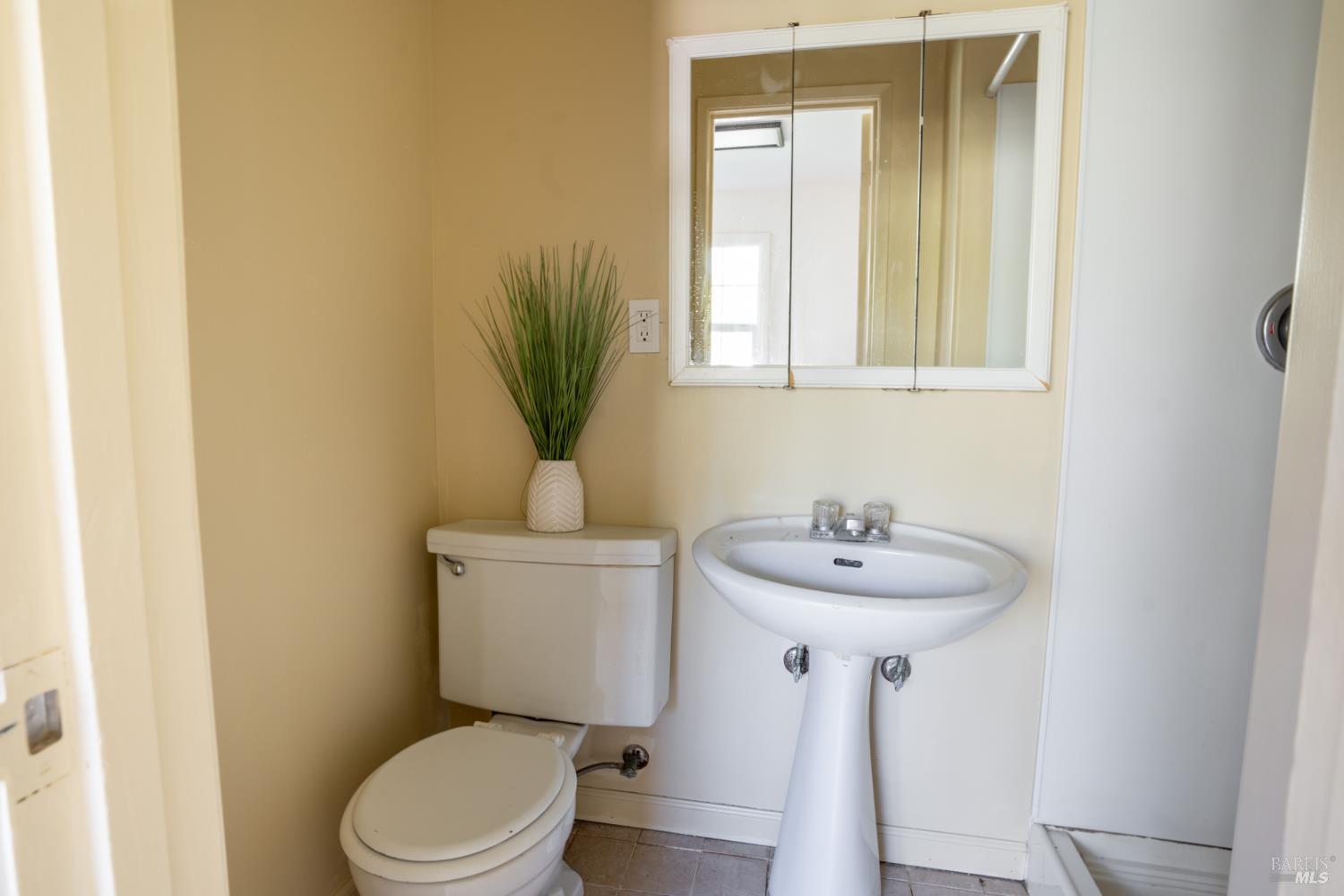 490 Cornish Lane Angwin, CA 94508 - Photo 16 of 30 a bathroom with a sink toilet and a mirror