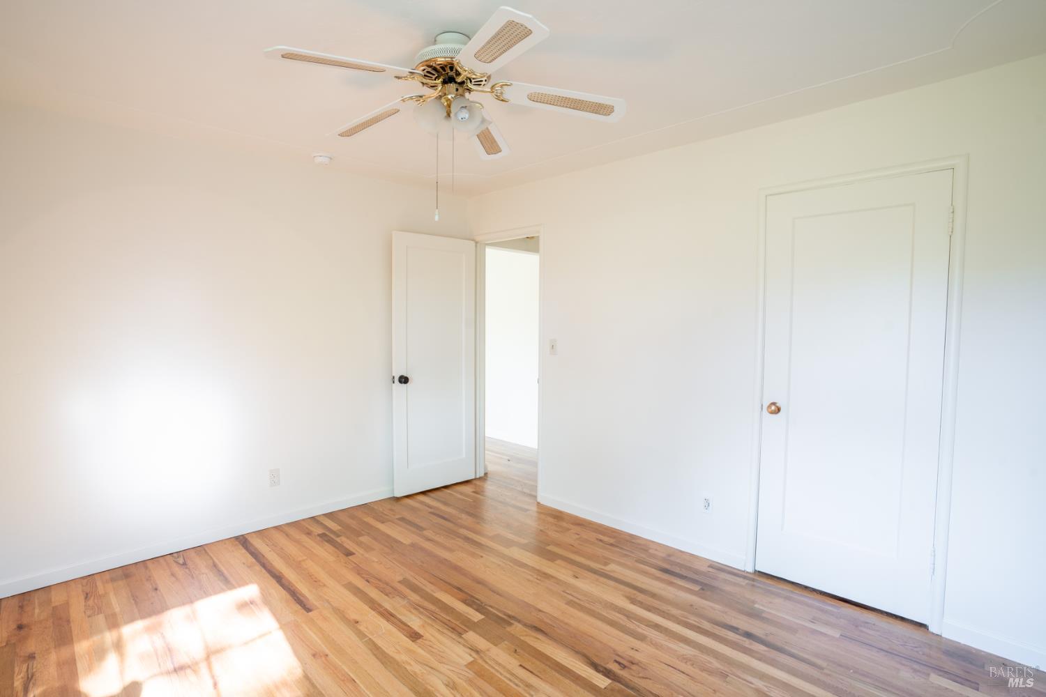 490 Cornish Lane Angwin, CA 94508 - Photo 25 of 30 a view of empty room with wooden floor