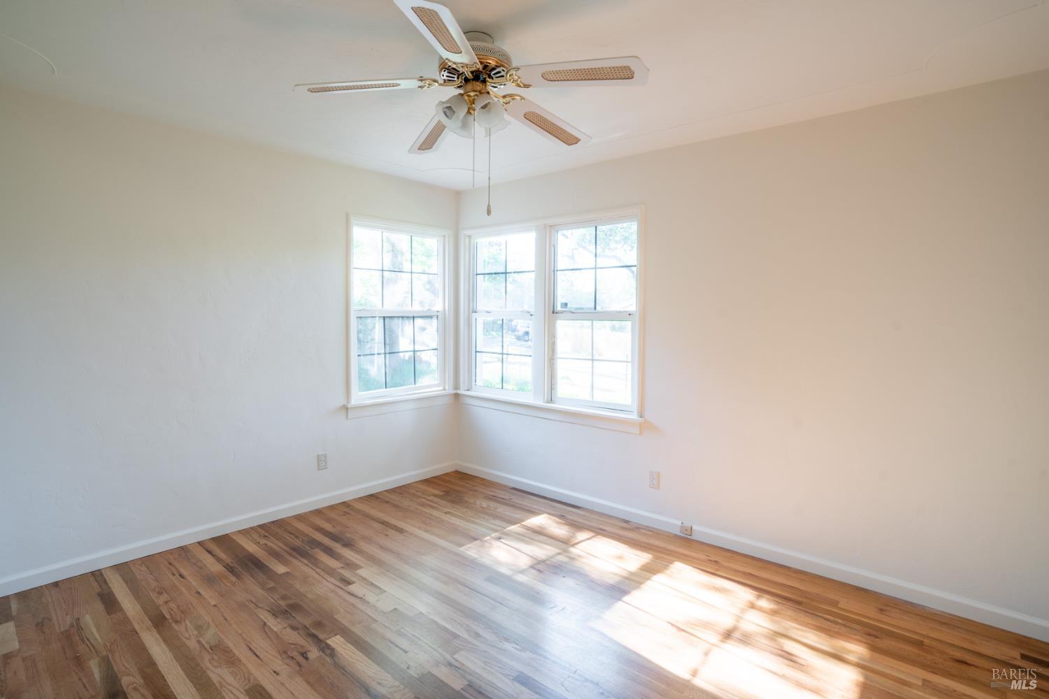 490 Cornish Lane Angwin, CA 94508 - Photo 28 of 30 a view of empty room with wooden floor and fan