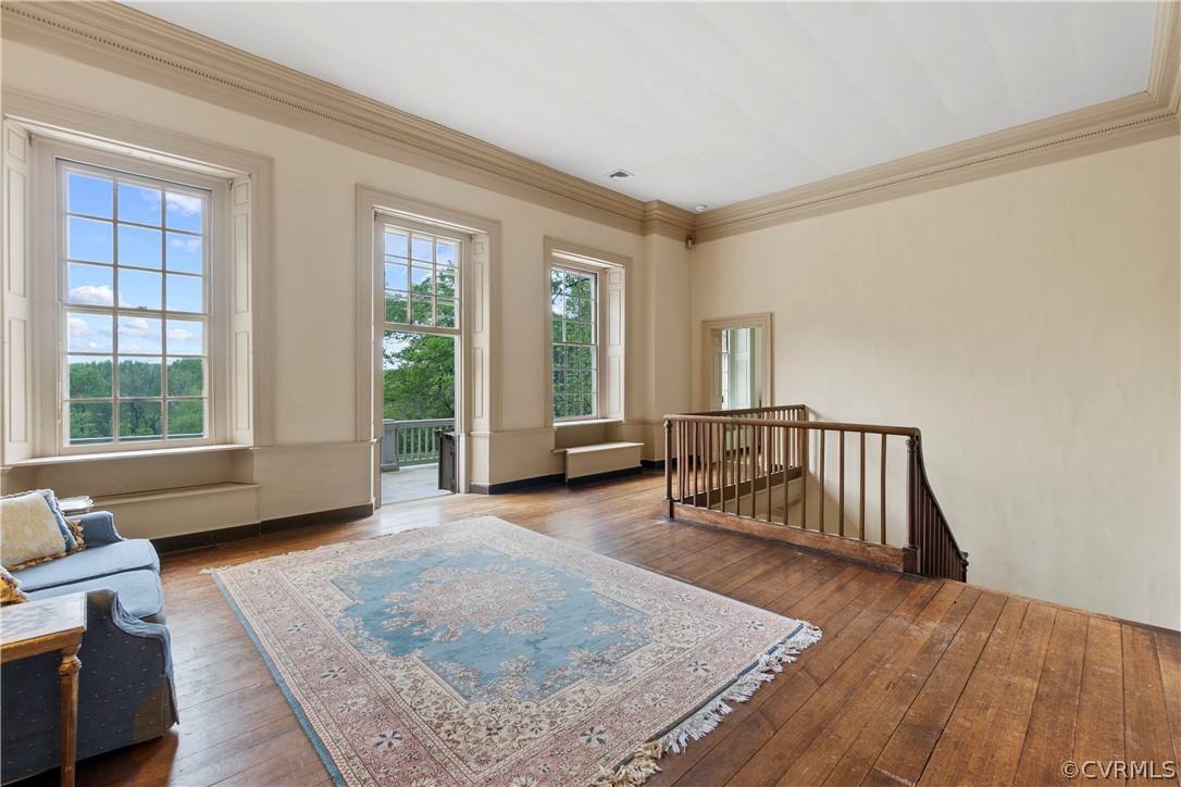 211 Ross Road Henrico, VA 23229 - Photo 23 of 50 a view of an empty room with wooden floor and a window