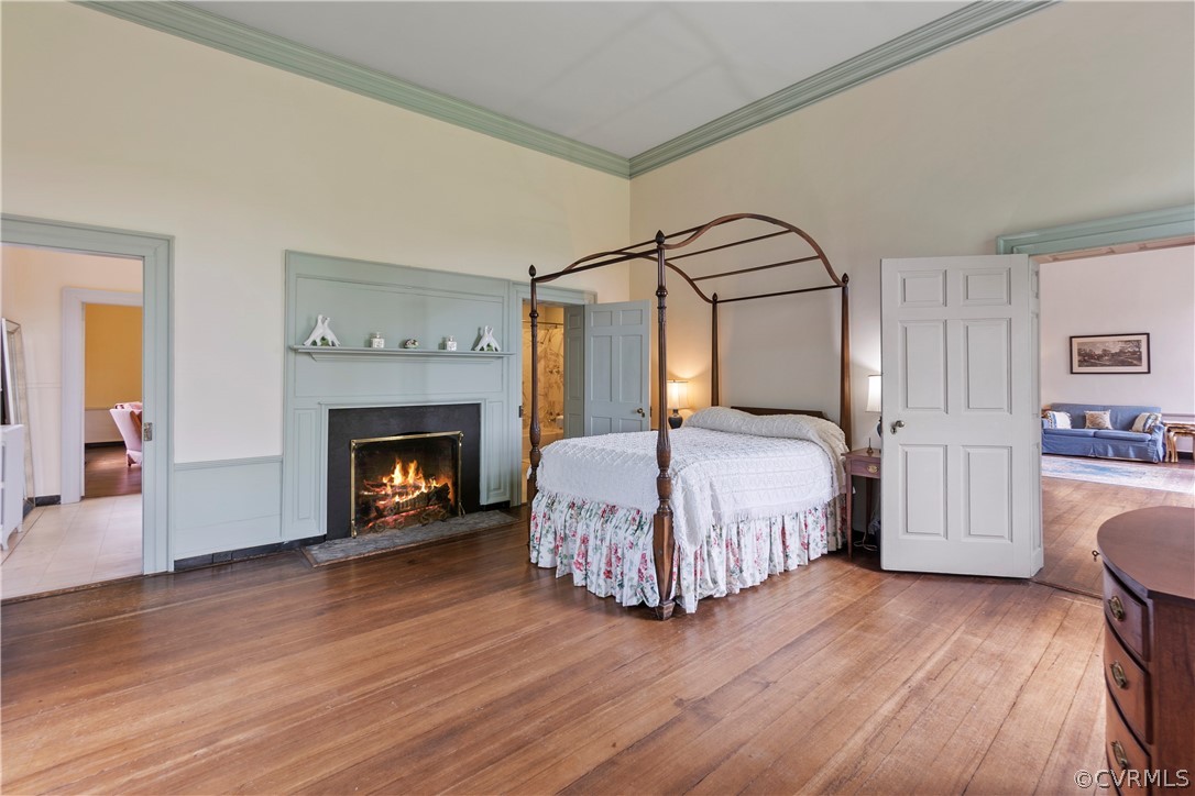 211 Ross Road Henrico, VA 23229 - Photo 36 of 50 a bedroom with a bed and a fireplace