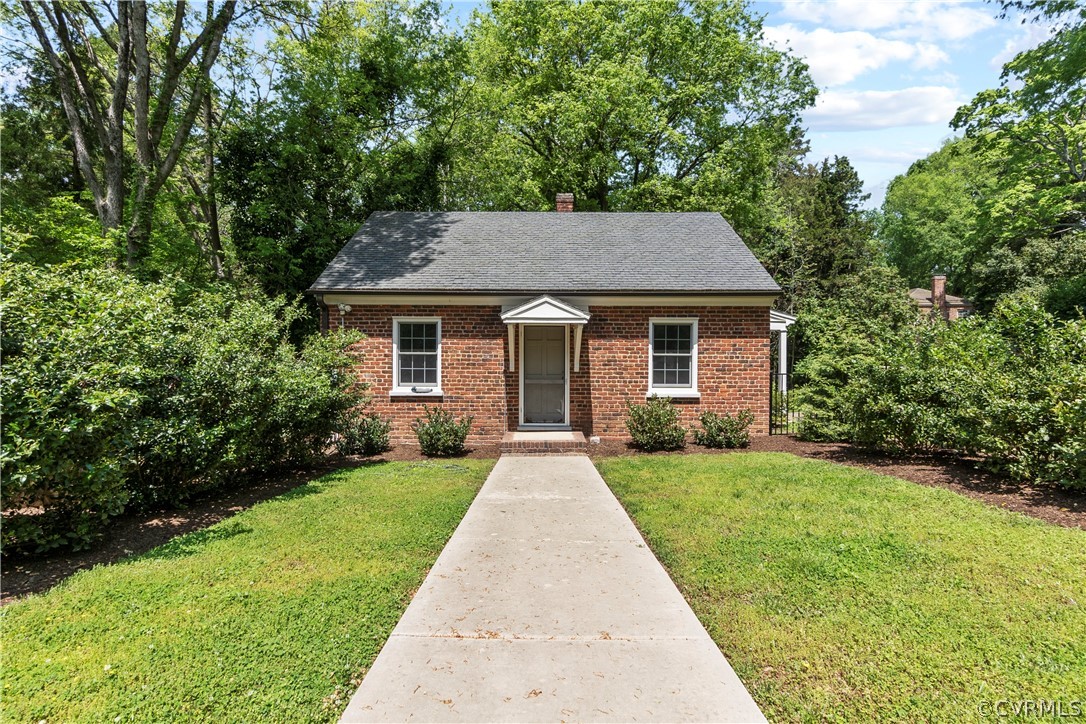 211 Ross Road Henrico, VA 23229 - Photo 43 of 50 a front view of house with yard and green space