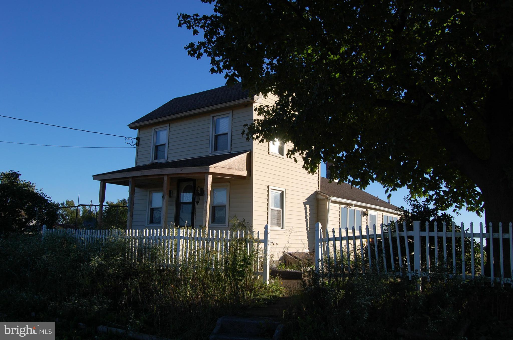 12609 Eaton Road Rocky Ridge, MD 21778 - Photo 1 of 25 a front view of a house with yard
