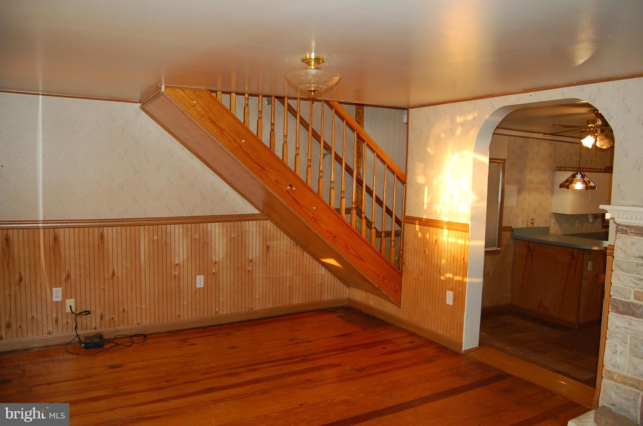 12609 Eaton Road Rocky Ridge, MD 21778 - Photo 14 of 25 a view of entryway with wooden floor