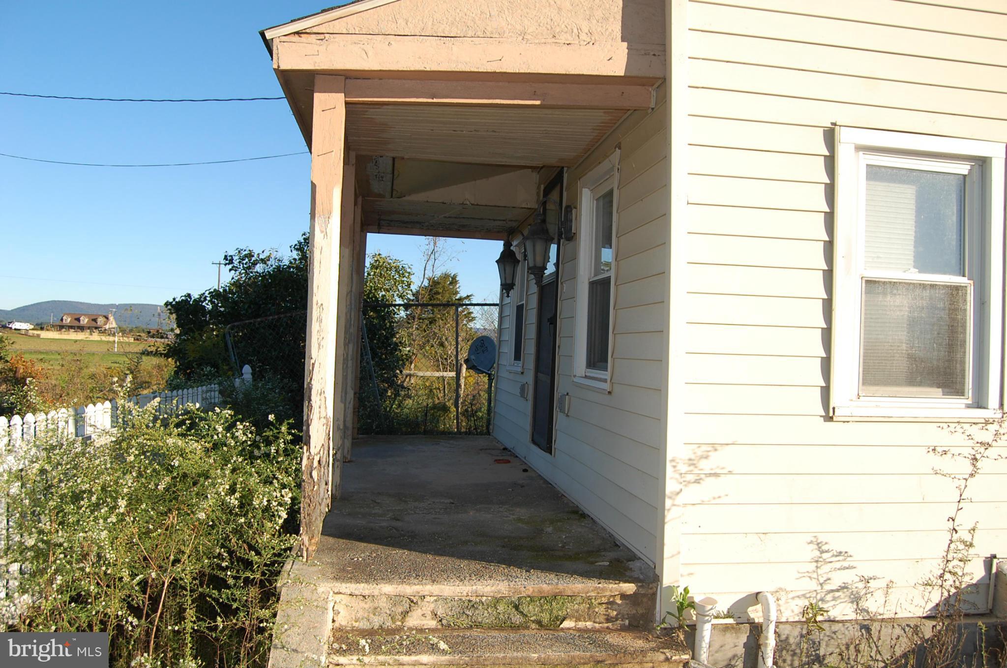 12609 Eaton Road Rocky Ridge, MD 21778 - Photo 3 of 25 a view of a porch