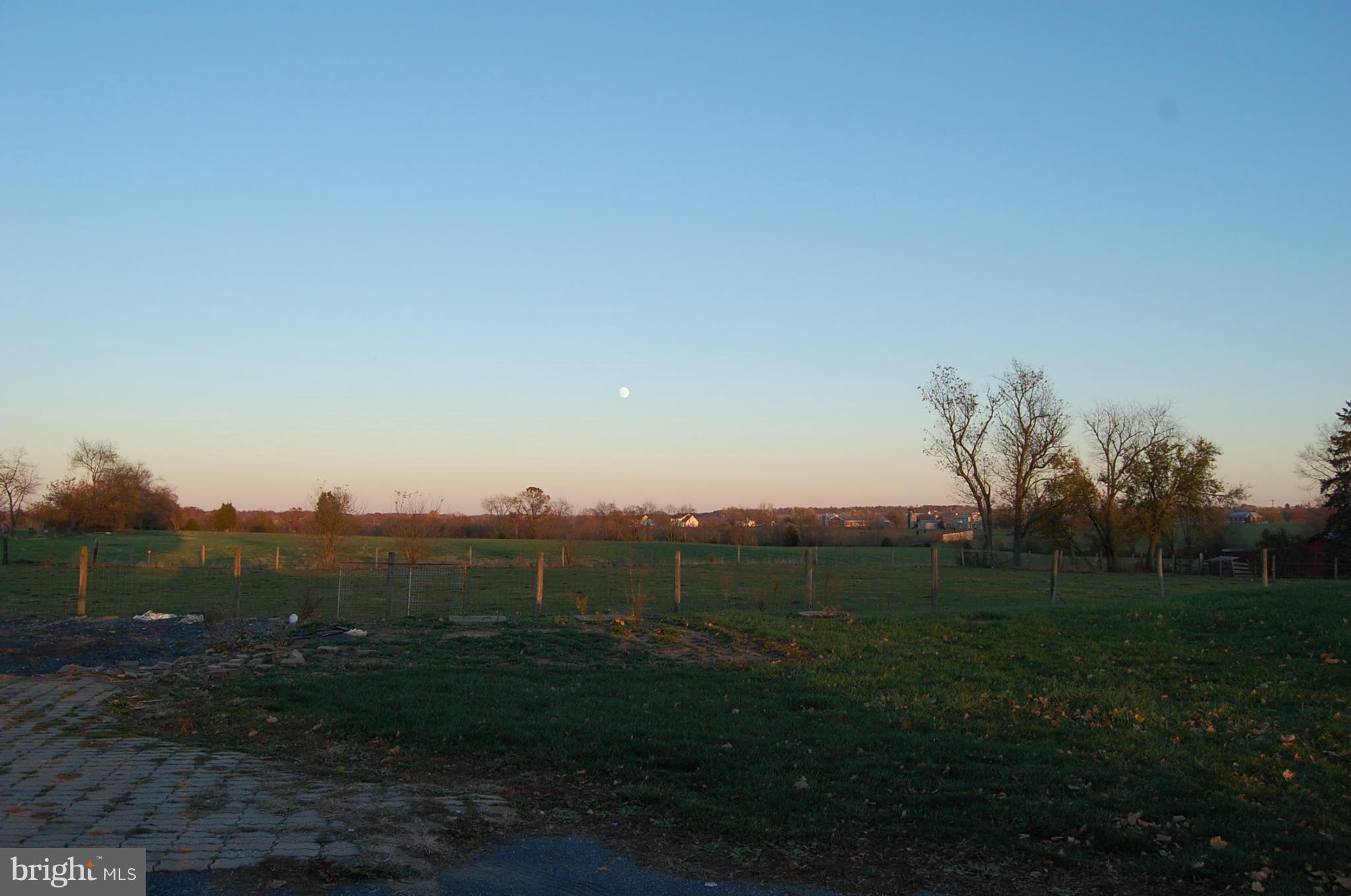 12609 Eaton Road Rocky Ridge, MD 21778 - Photo 25 of 25 a view of a grassy field with trees