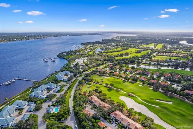 a view of a city with a lake