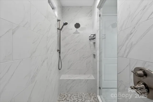 a bathroom with a glass shower