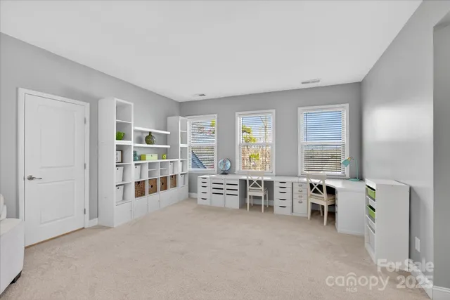 a room with furniture and window