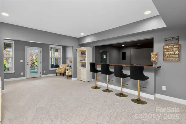 a living room with furniture and a table