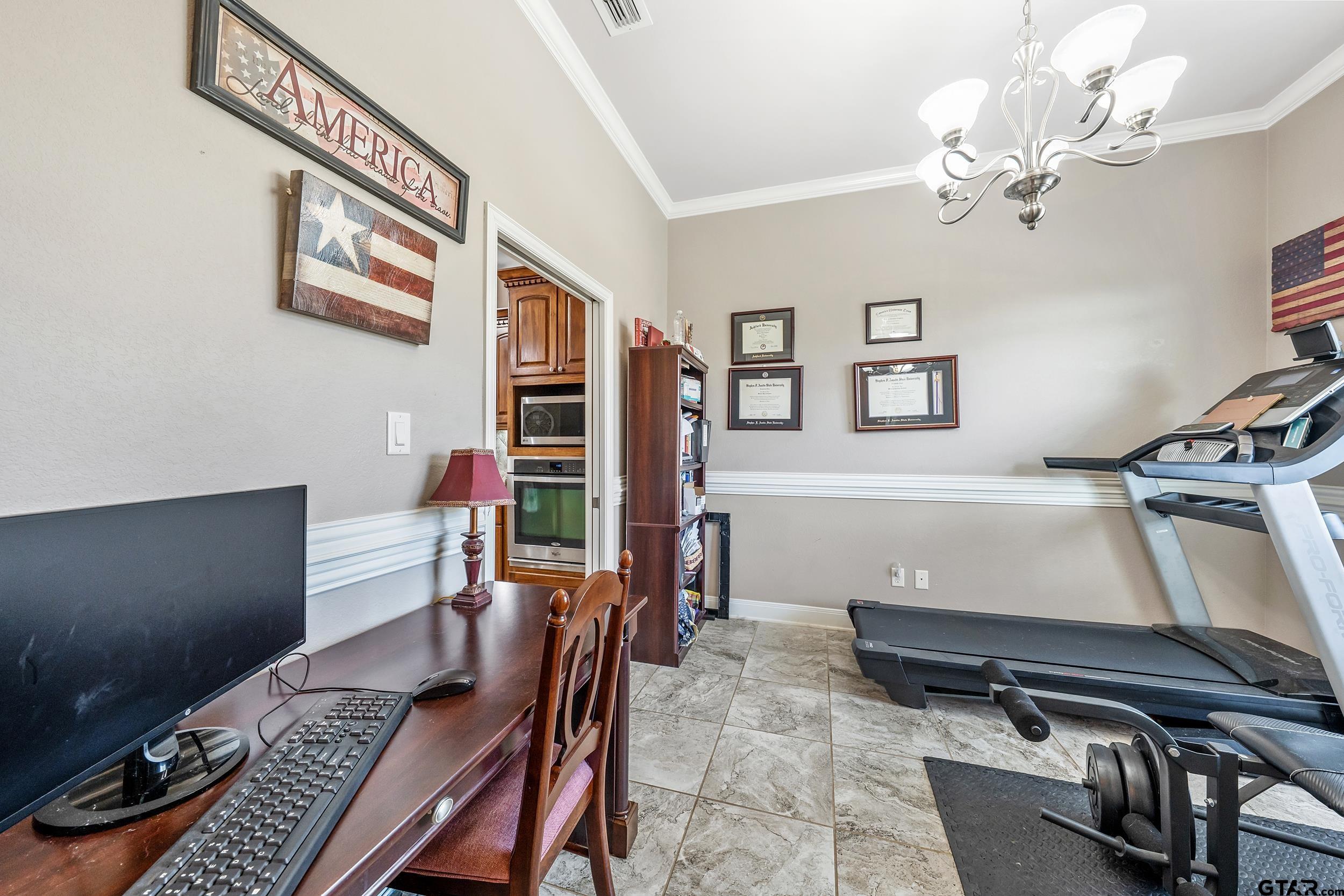 19499 Sara Lane Flint, TX 75762 - Photo 24 of 31 a view of a workspace with furniture