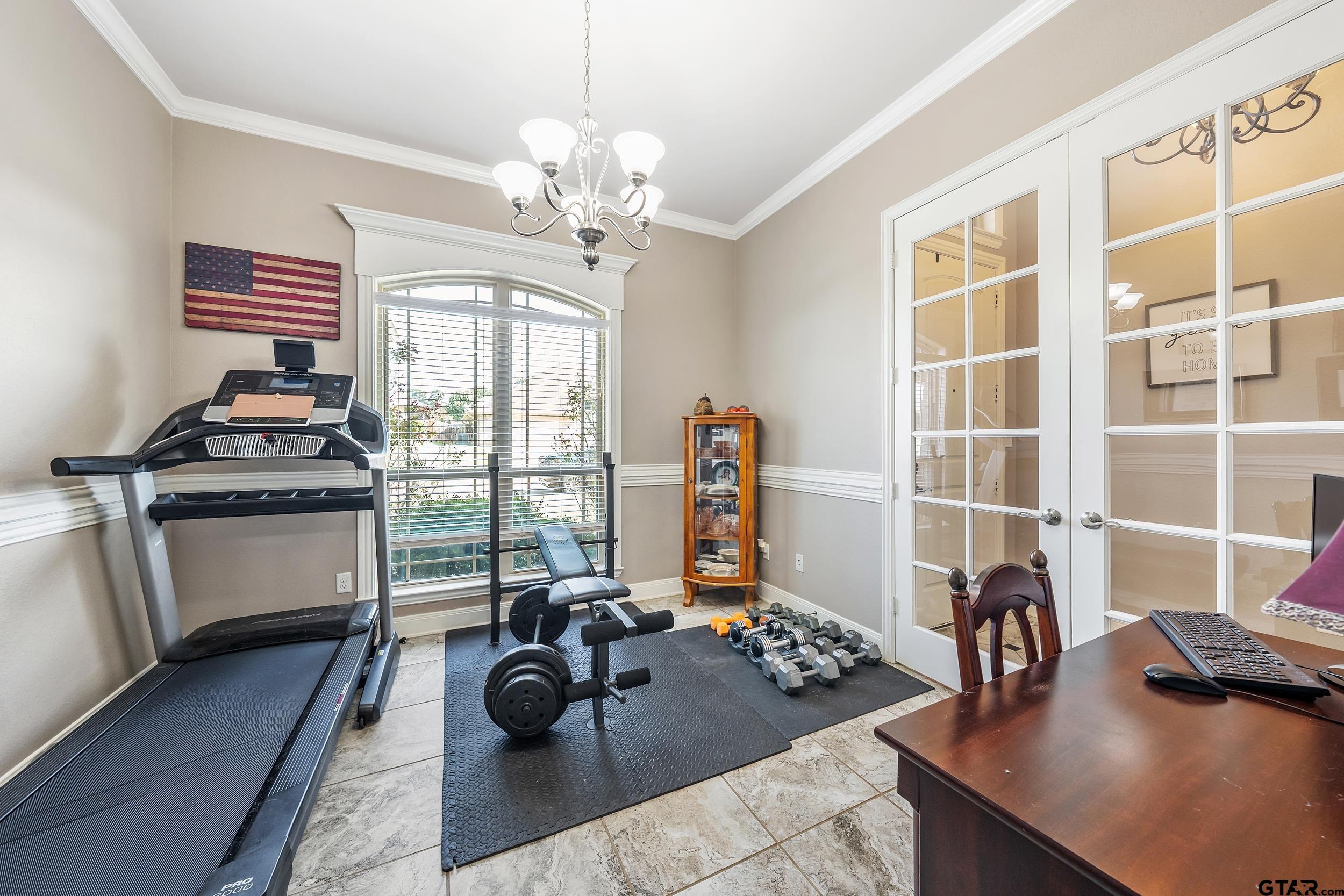 19499 Sara Lane Flint, TX 75762 - Photo 25 of 31 a view of a workspace with furniture and a window