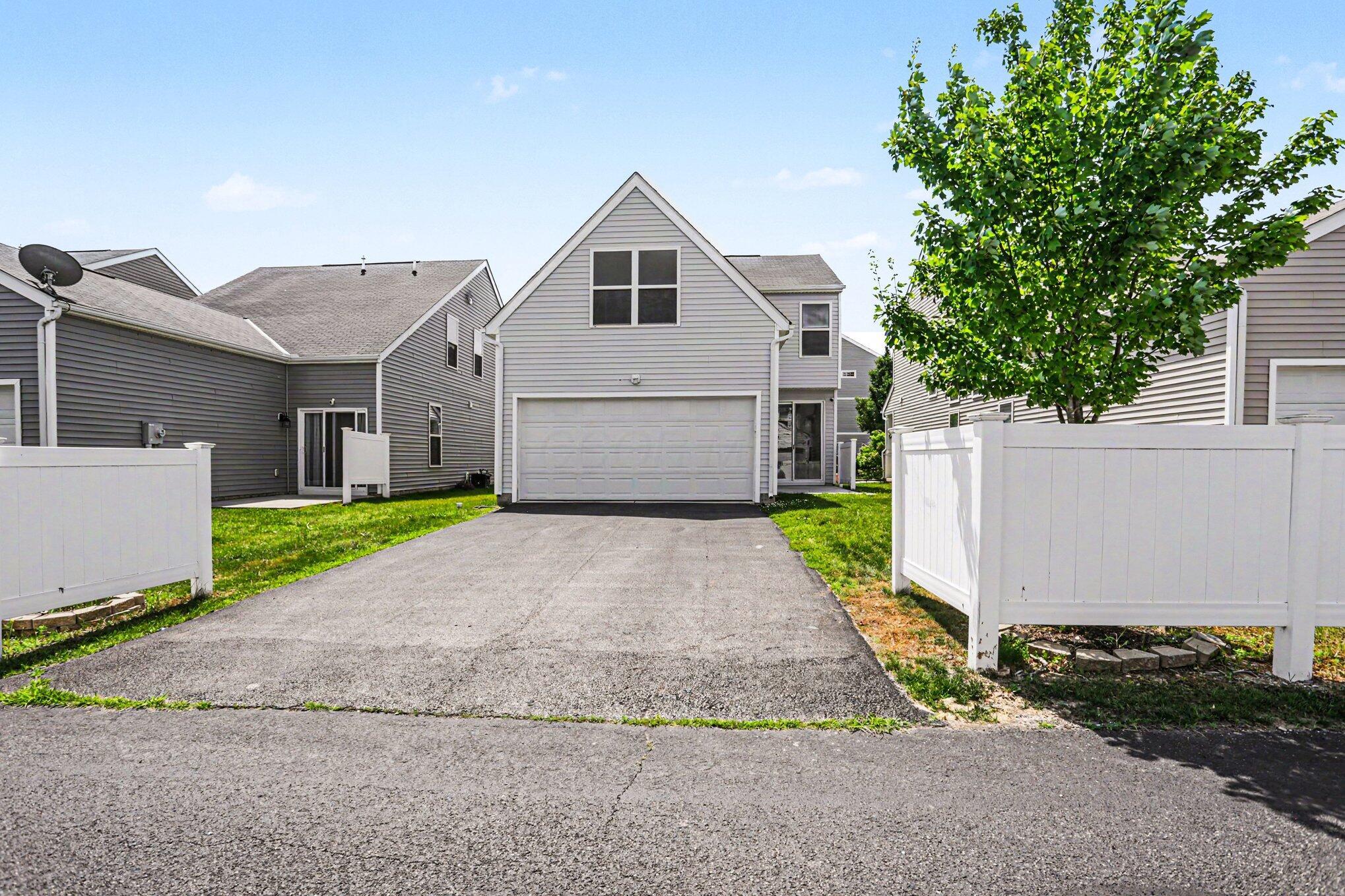 5458 Spring River Avenue Dublin, OH 43016 - Photo 33 of 38 Garage / Driveway
