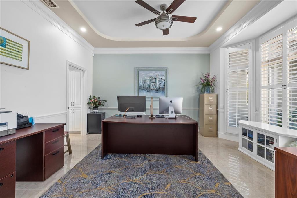 2115 Lychee Lane Nokomis, FL 34275 - Photo 20 of 85 a living room with furniture and a window