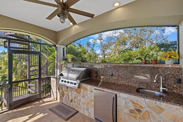 a kitchen that has a stove and a refrigerator