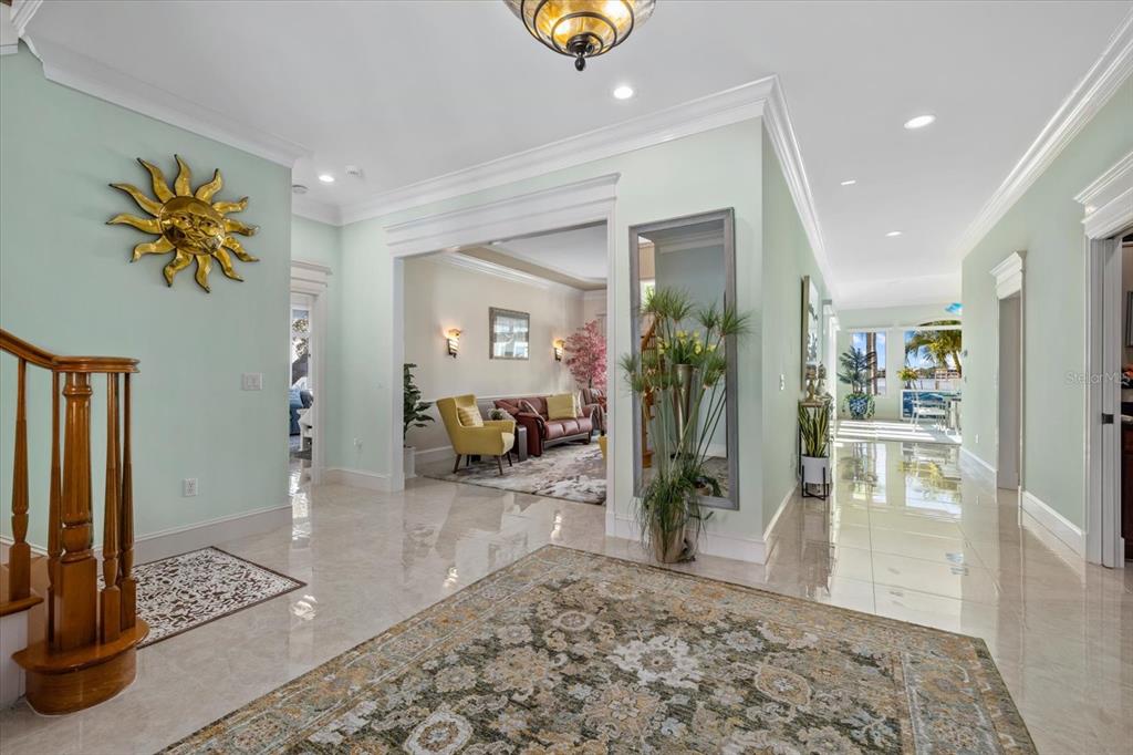 2115 Lychee Lane Nokomis, FL 34275 - Photo 31 of 85 a living room with furniture and a rug