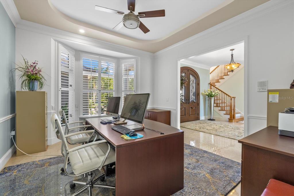 2115 Lychee Lane Nokomis, FL 34275 - Photo 32 of 85 a workspace with furniture and a window