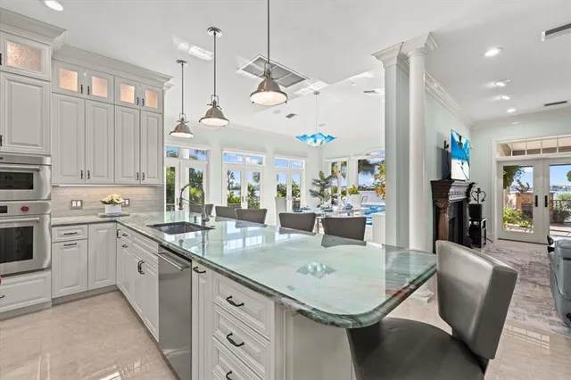 a front view of a house with a yard porch and sitting area